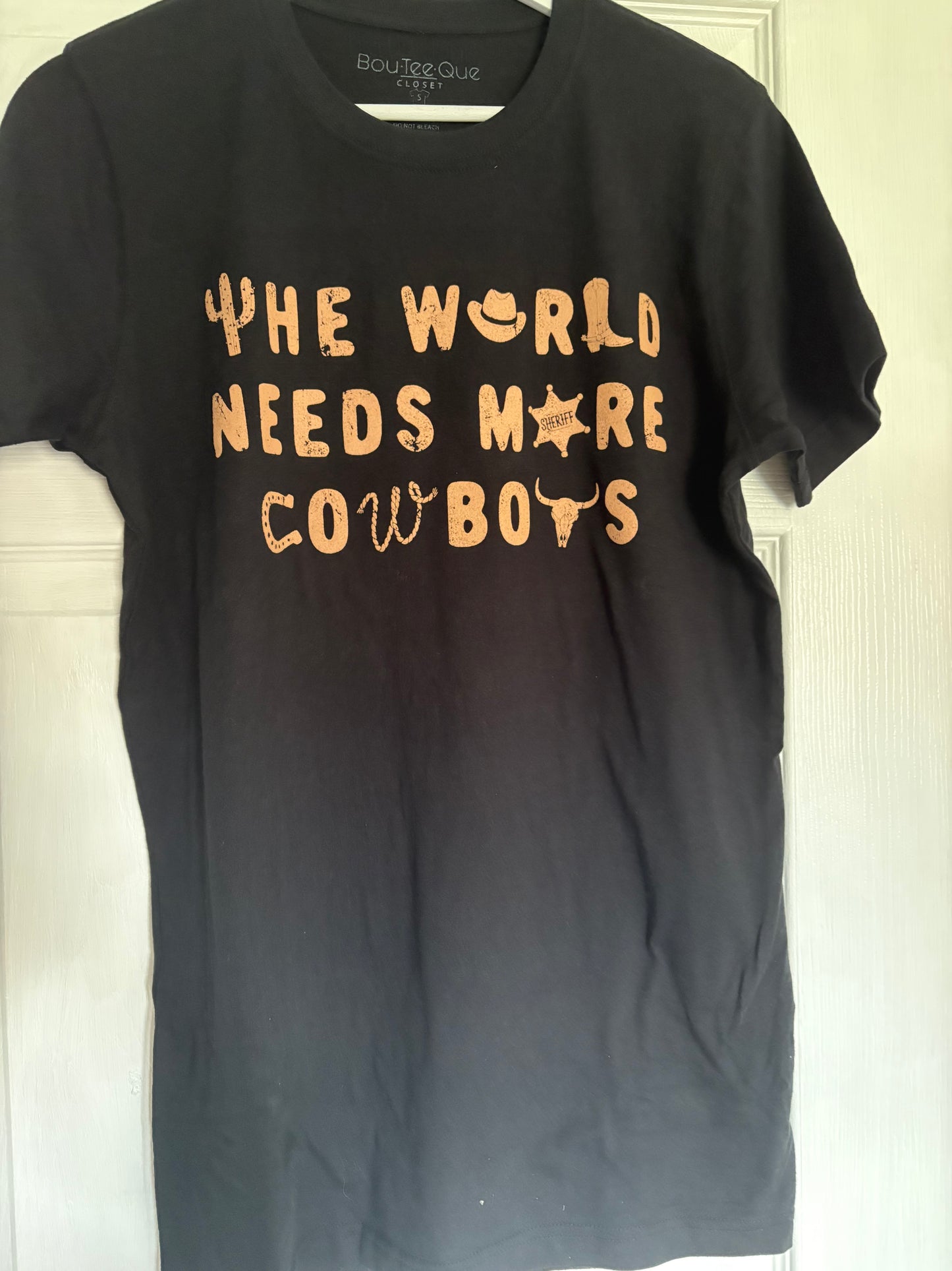 The World Needs More Cowboys Top