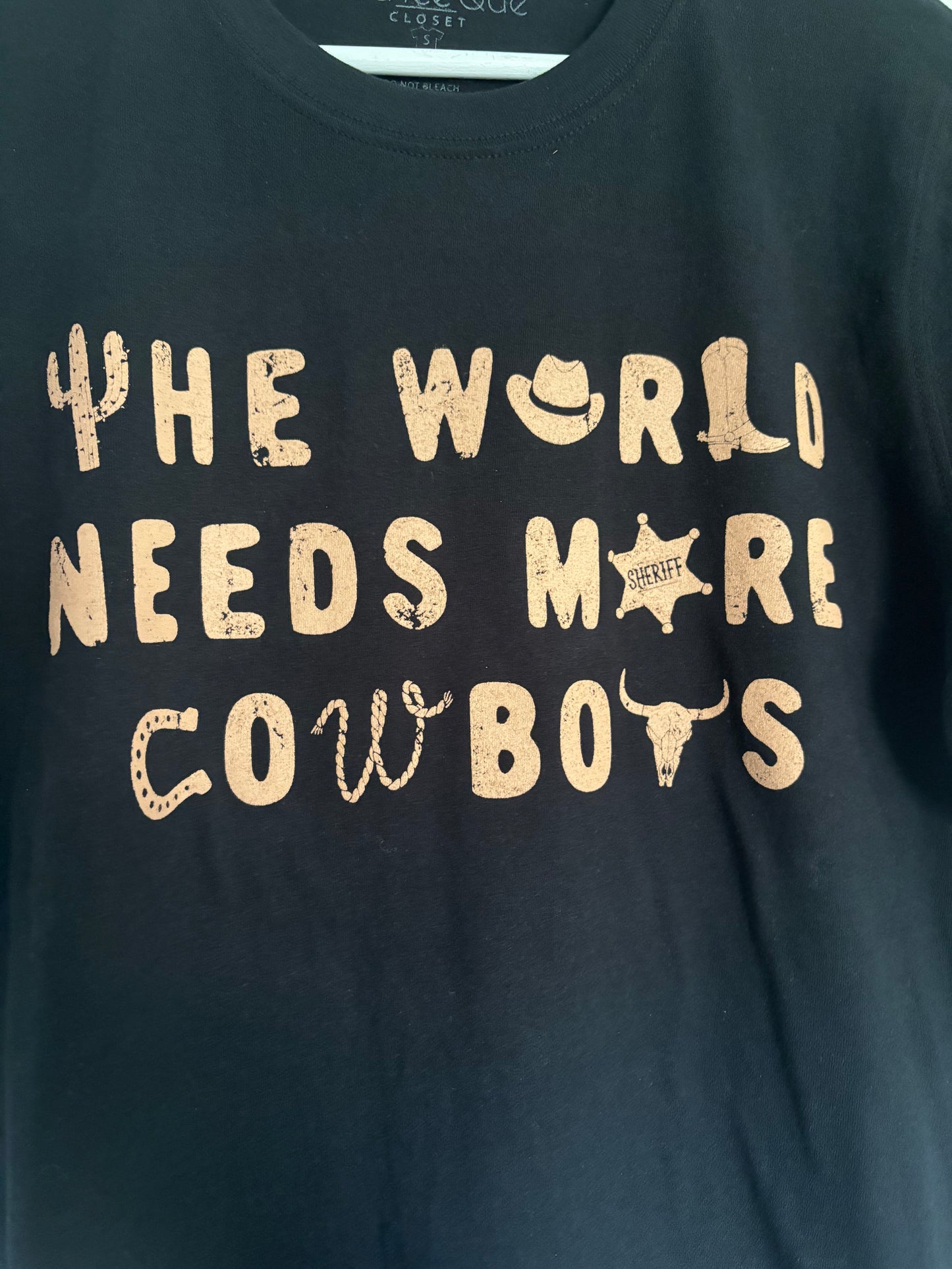 The World Needs More Cowboys Top